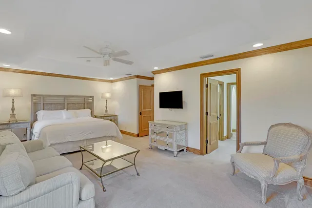 a spacious bathroom with a double vanity sink and a mirror