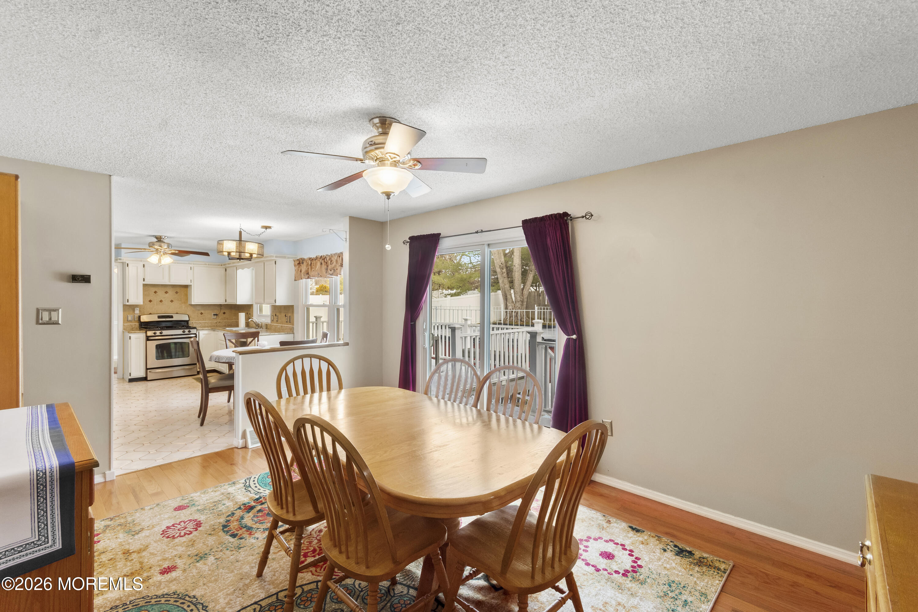 46 Hickory Hill Road Jackson, NJ 08527 - Photo 15 of 33 a view of a a dining room with furniture window and wooden floor