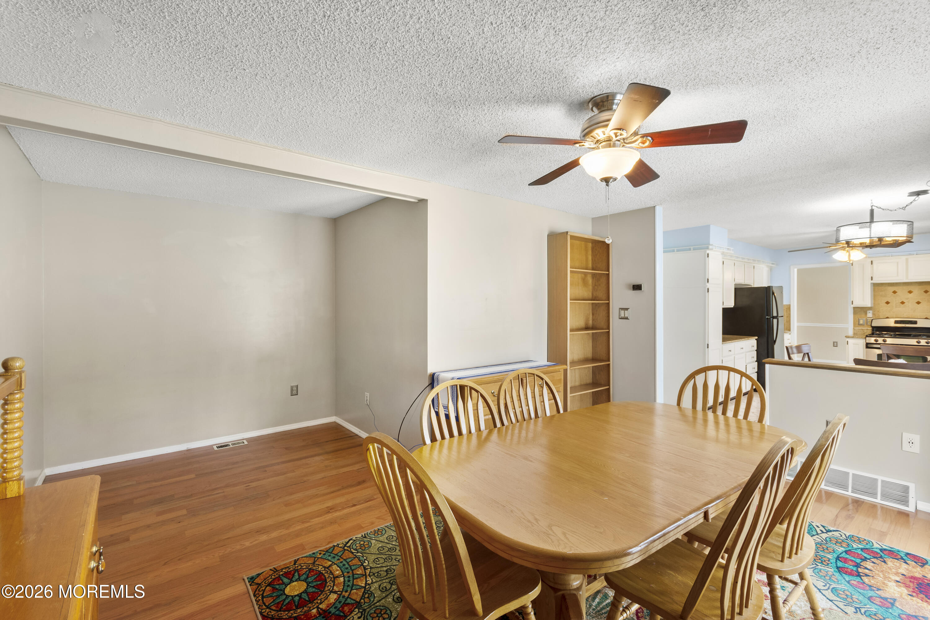 46 Hickory Hill Road Jackson, NJ 08527 - Photo 16 of 33 a bedroom with a bed and a table in it