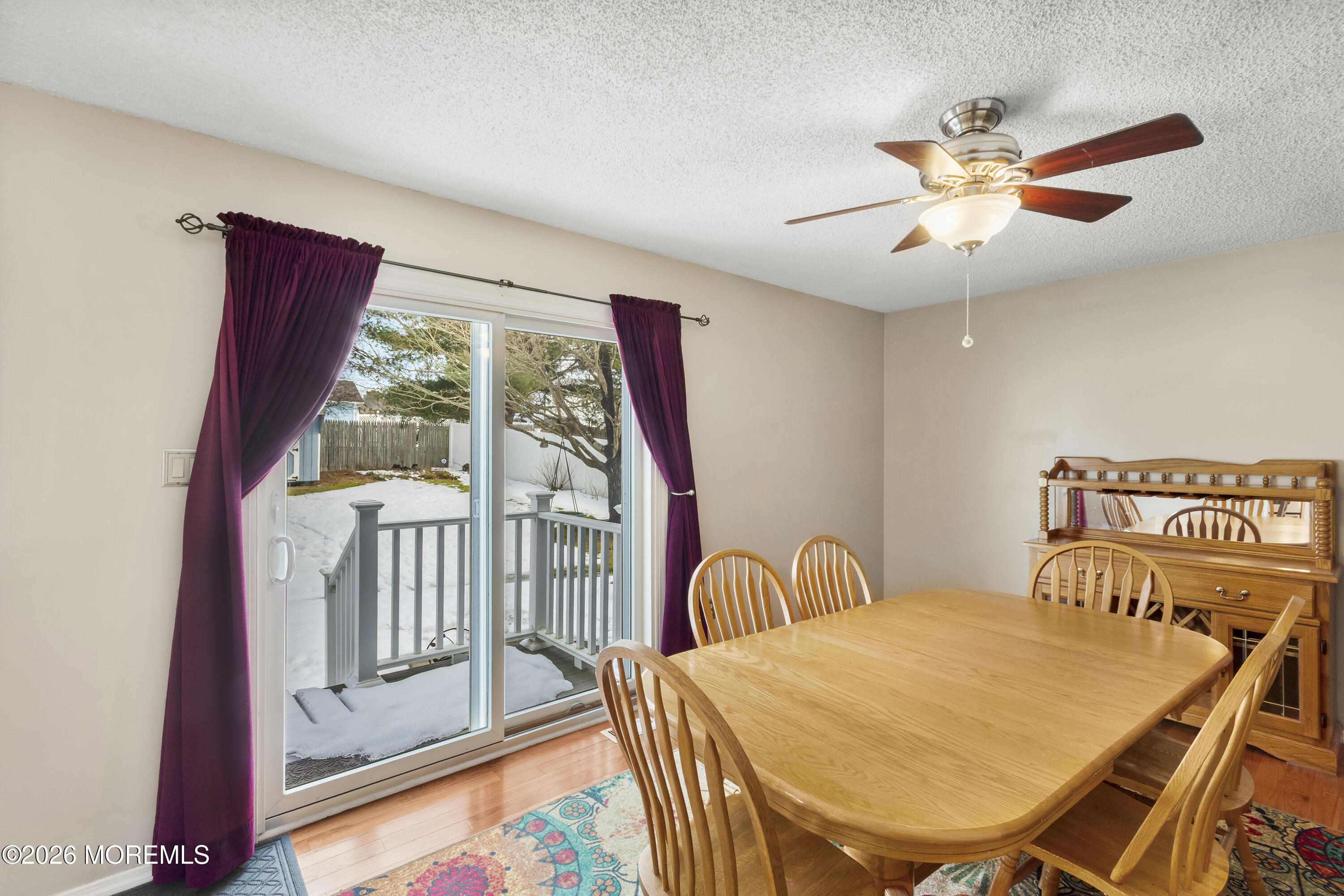 46 Hickory Hill Road Jackson, NJ 08527 - Photo 17 of 33 a bedroom with a bed and a chandelier