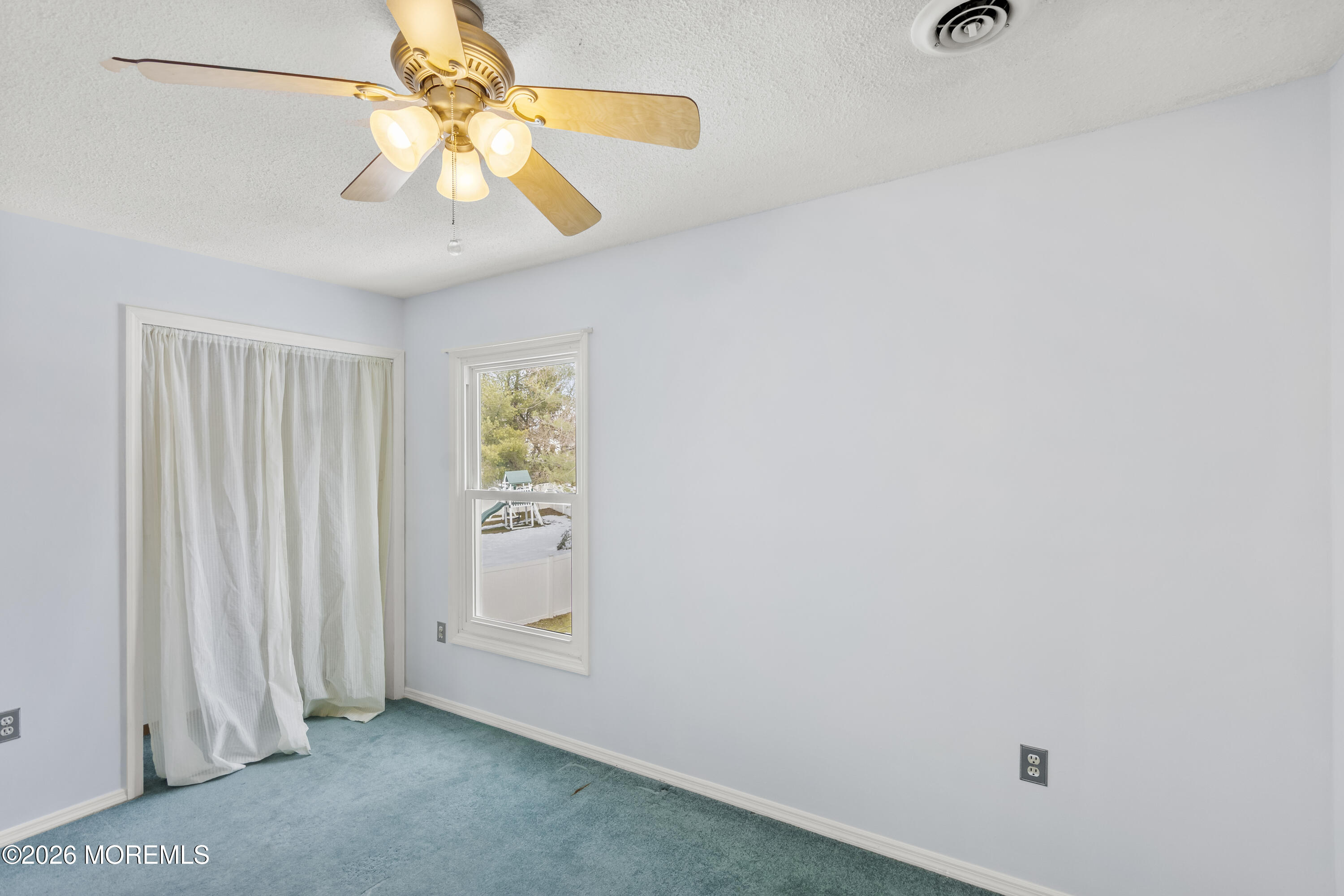 46 Hickory Hill Road Jackson, NJ 08527 - Photo 24 of 33 an empty room with a window and a fan