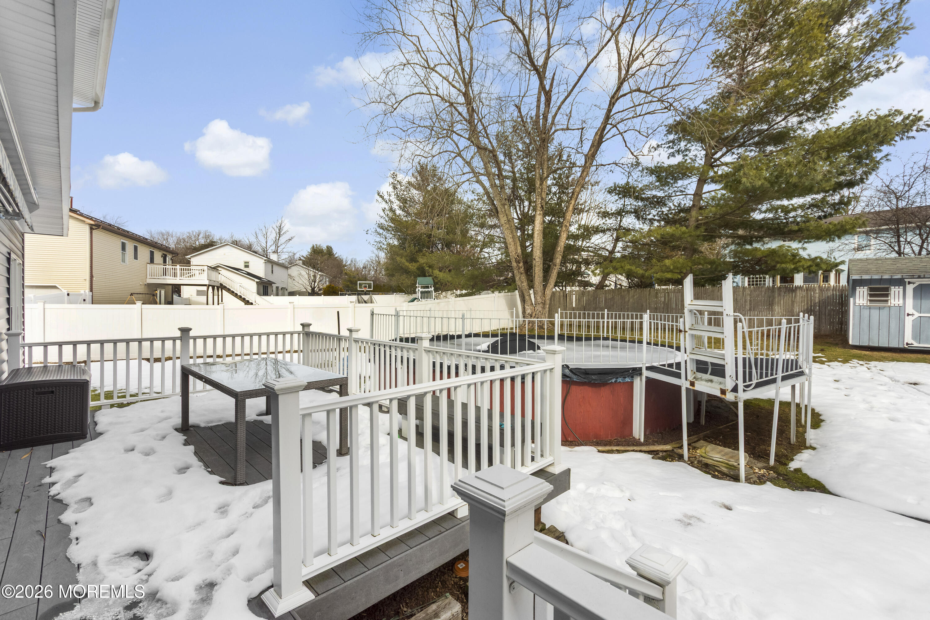 46 Hickory Hill Road Jackson, NJ 08527 - Photo 31 of 33 a view of balcony with wooden floor and seating