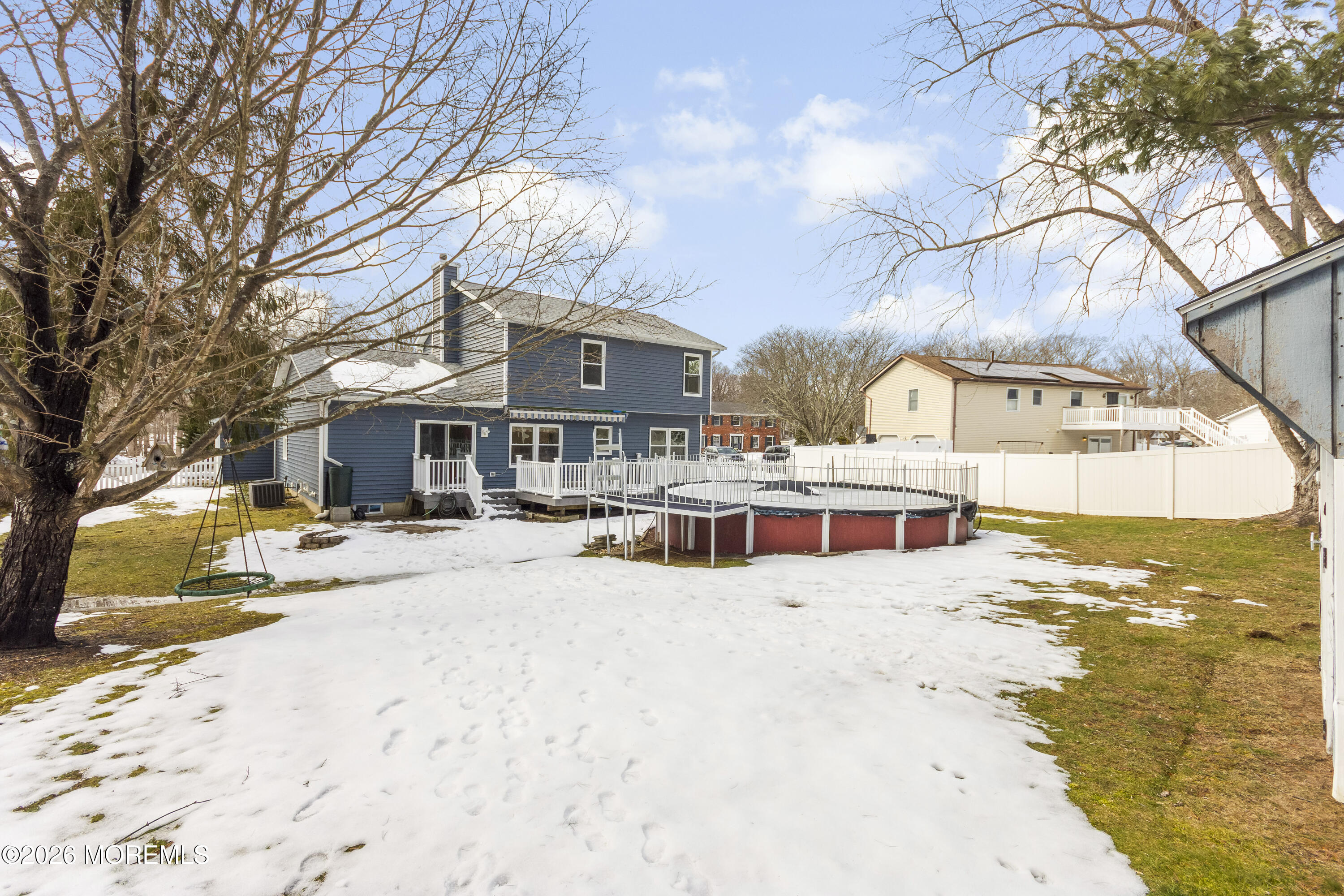 46 Hickory Hill Road Jackson, NJ 08527 - Photo 32 of 33 a view of a house with snow on the road