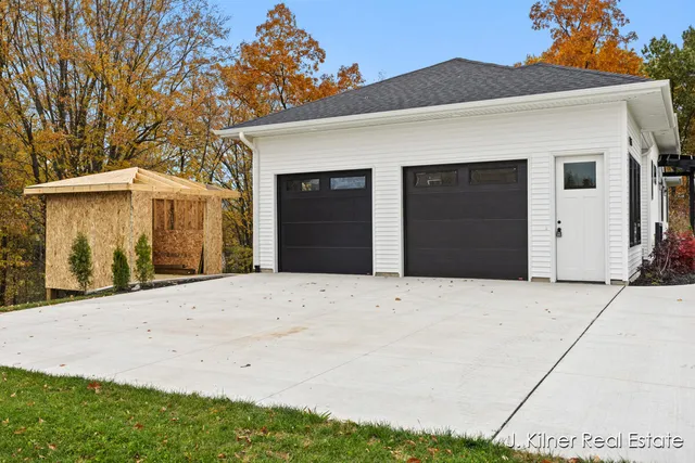 $799,900 | 9465 Wabasis Pointe Drive Northeast, Greenville, MI 48838