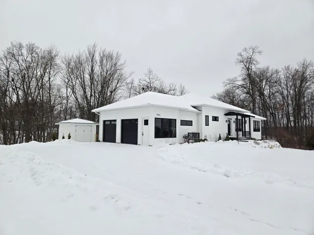 $799,900 | 9465 Wabasis Pointe Drive Northeast, Greenville, MI 48838