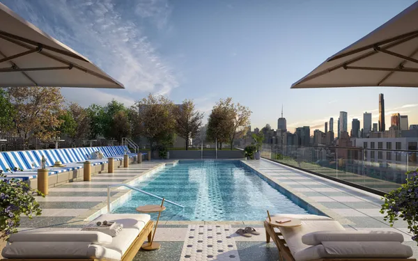 a view of swimming pool with seating space