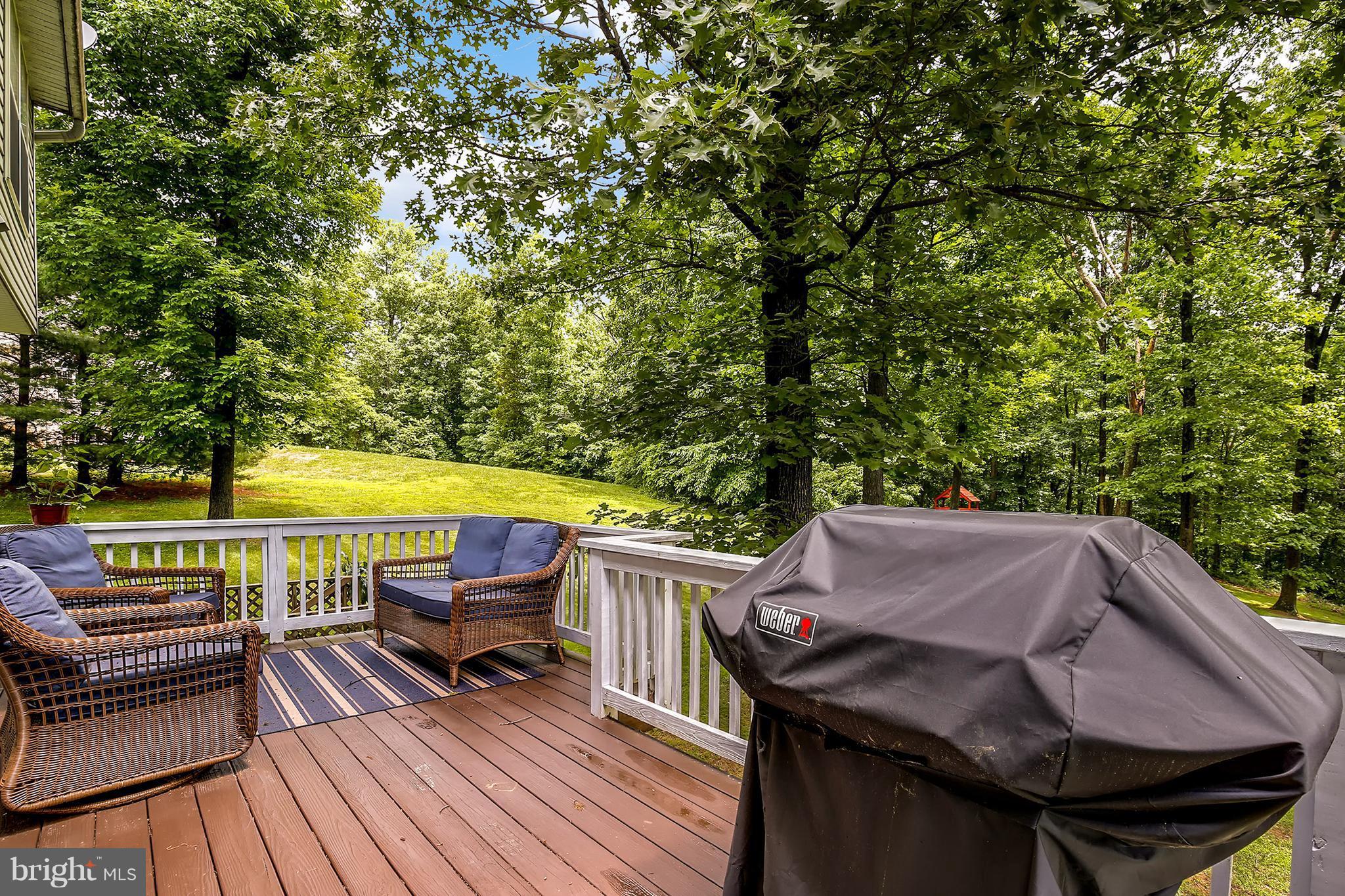 3 Brooks Court Baltimore, MD 21244 - Photo 24 of 30 a terrace with outdoor seating and trees