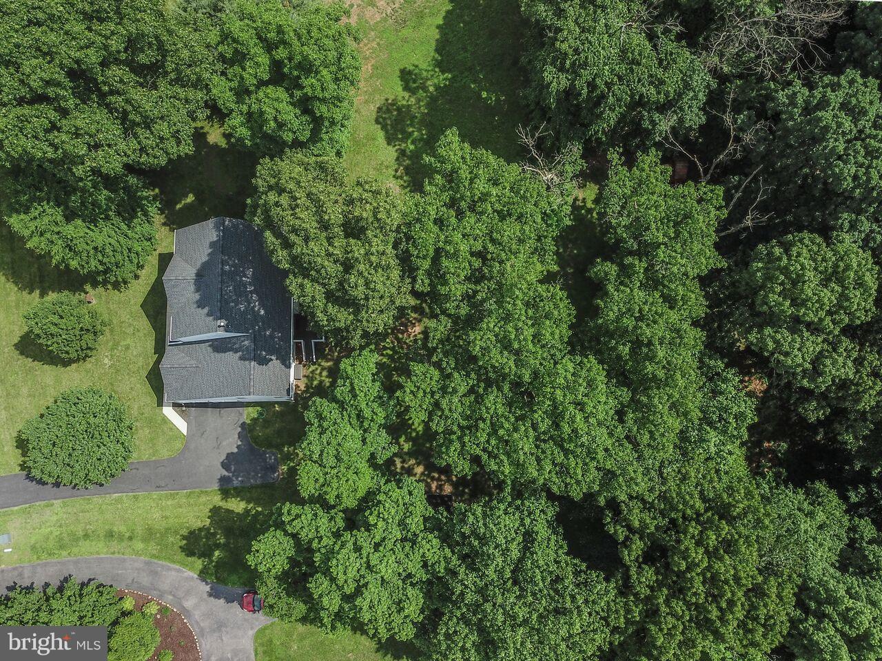 3 Brooks Court Baltimore, MD 21244 - Photo 30 of 30 an aerial view of a house with a yard and large tree