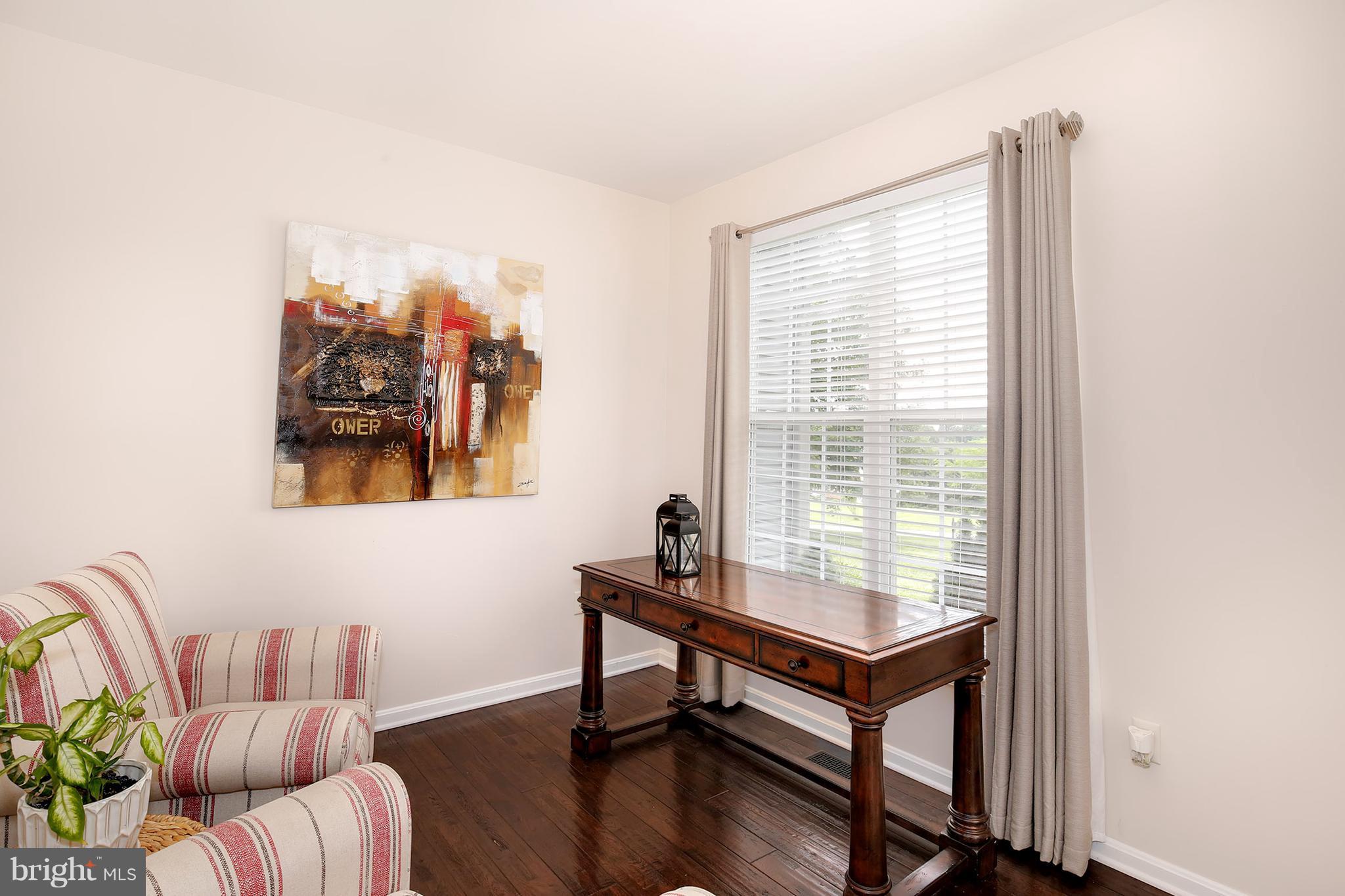 3 Brooks Court Baltimore, MD 21244 - Photo 4 of 30 a living room with furniture and a window