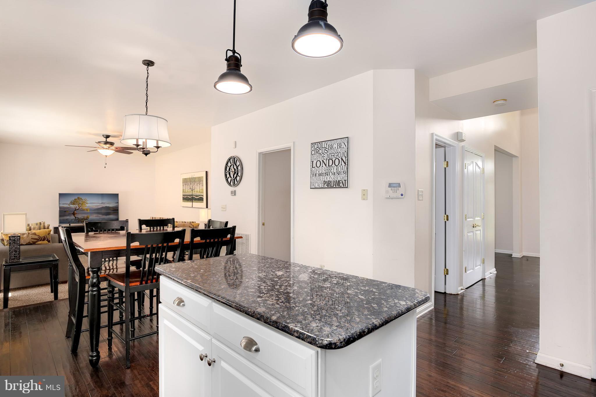 3 Brooks Court Baltimore, MD 21244 - Photo 8 of 30 a view of a dining room with furniture and wooden floor