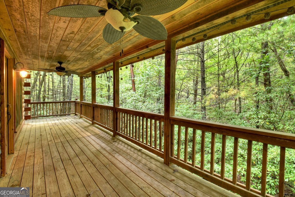 63 Posey Road Blue Ridge, GA 30513 - Photo 19 of 21 a view of balcony with wooden floor