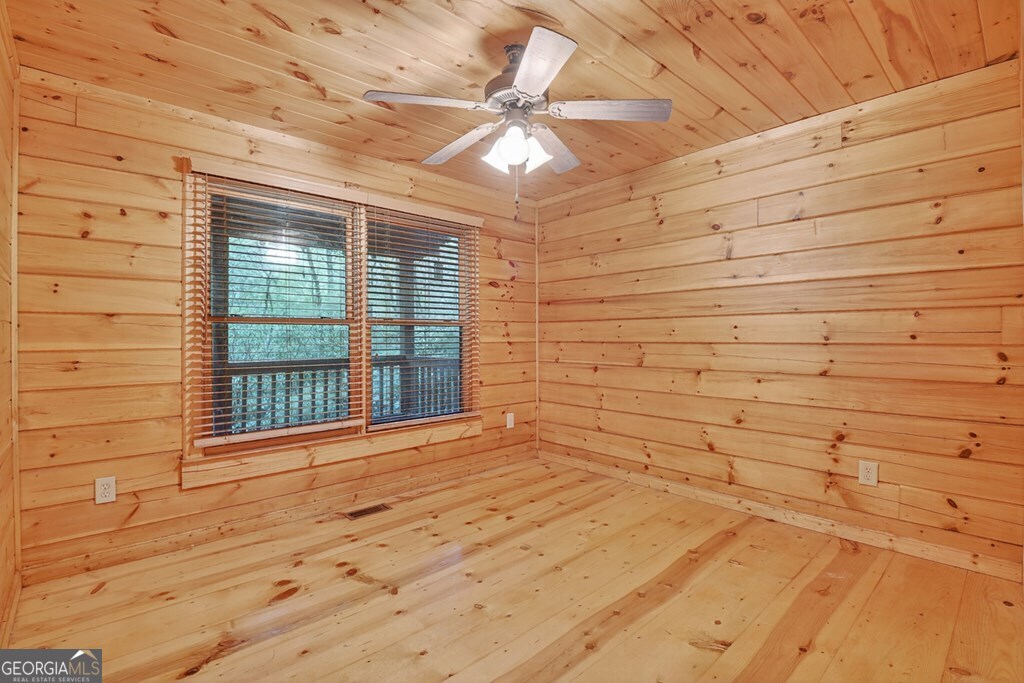 63 Posey Road Blue Ridge, GA 30513 - Photo 10 of 21 a view of an empty room with a window