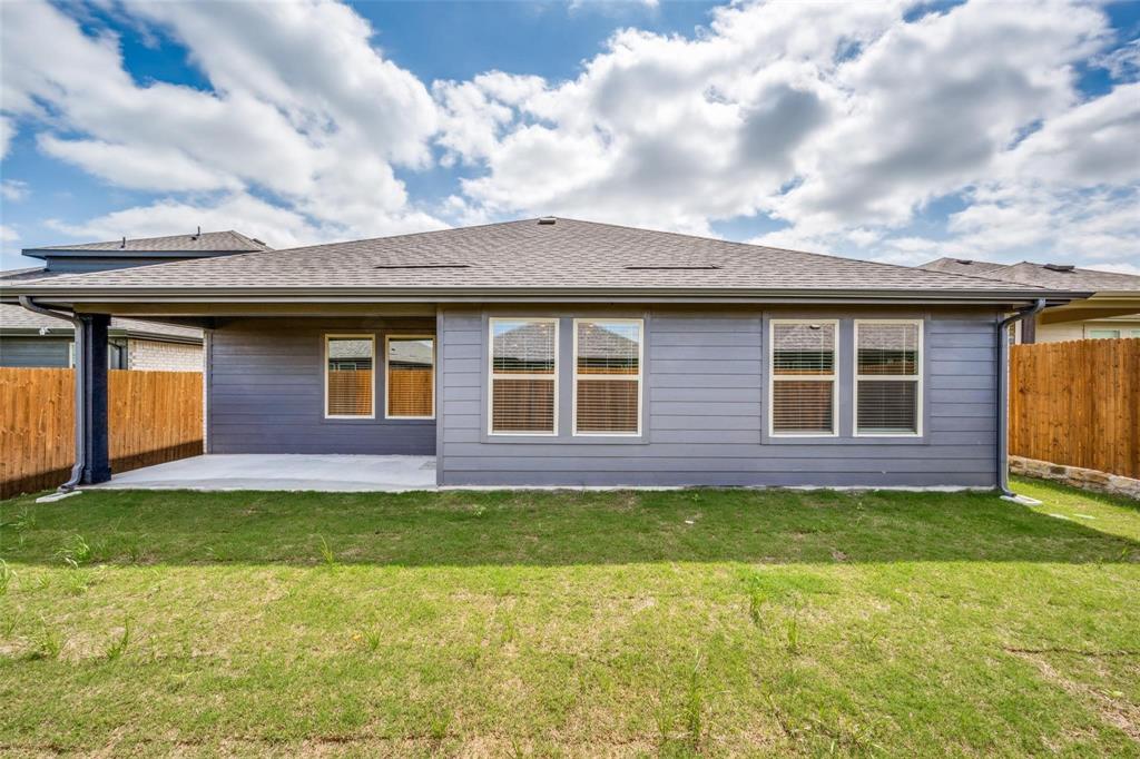 5113 Unity Drive Denton, TX 76207 - Photo 22 of 22 a view of a house with a yard