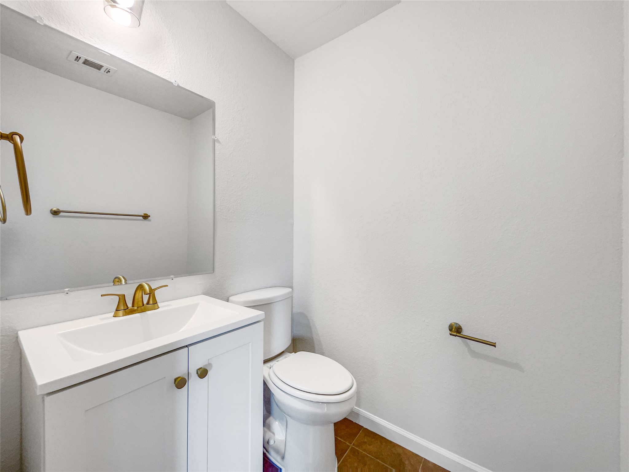 3407 Peachstone Place Spring, TX 77389 - Photo 11 of 17 a white toilet sitting next to a white sink
