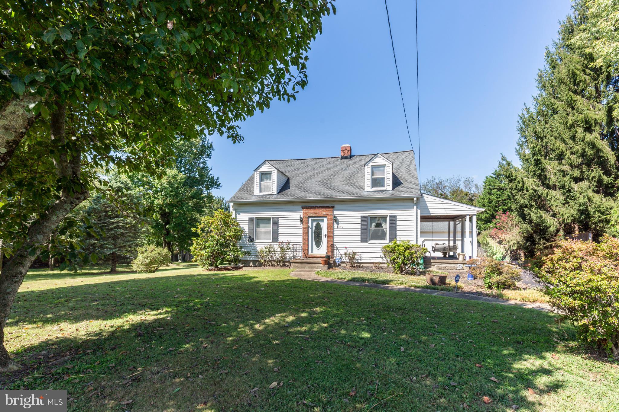 3402 Offutt Road Randallstown, MD 21133 - Photo 3 of 63 Charming home nestled in lush greenery.