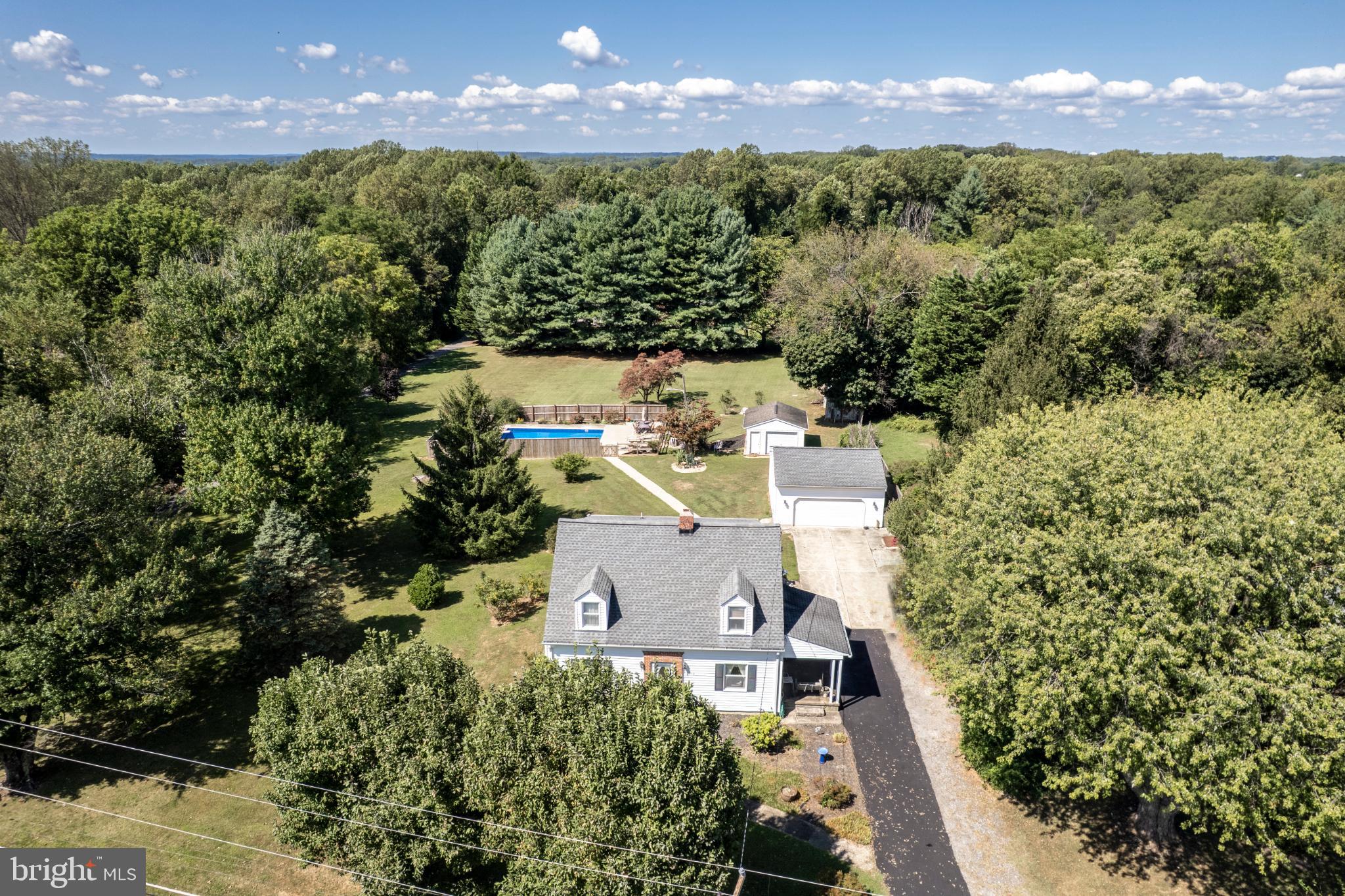 3402 Offutt Road Randallstown, MD 21133 - Photo 48 of 63 an aerial view of a house with a yard basket ball court and outdoor seating