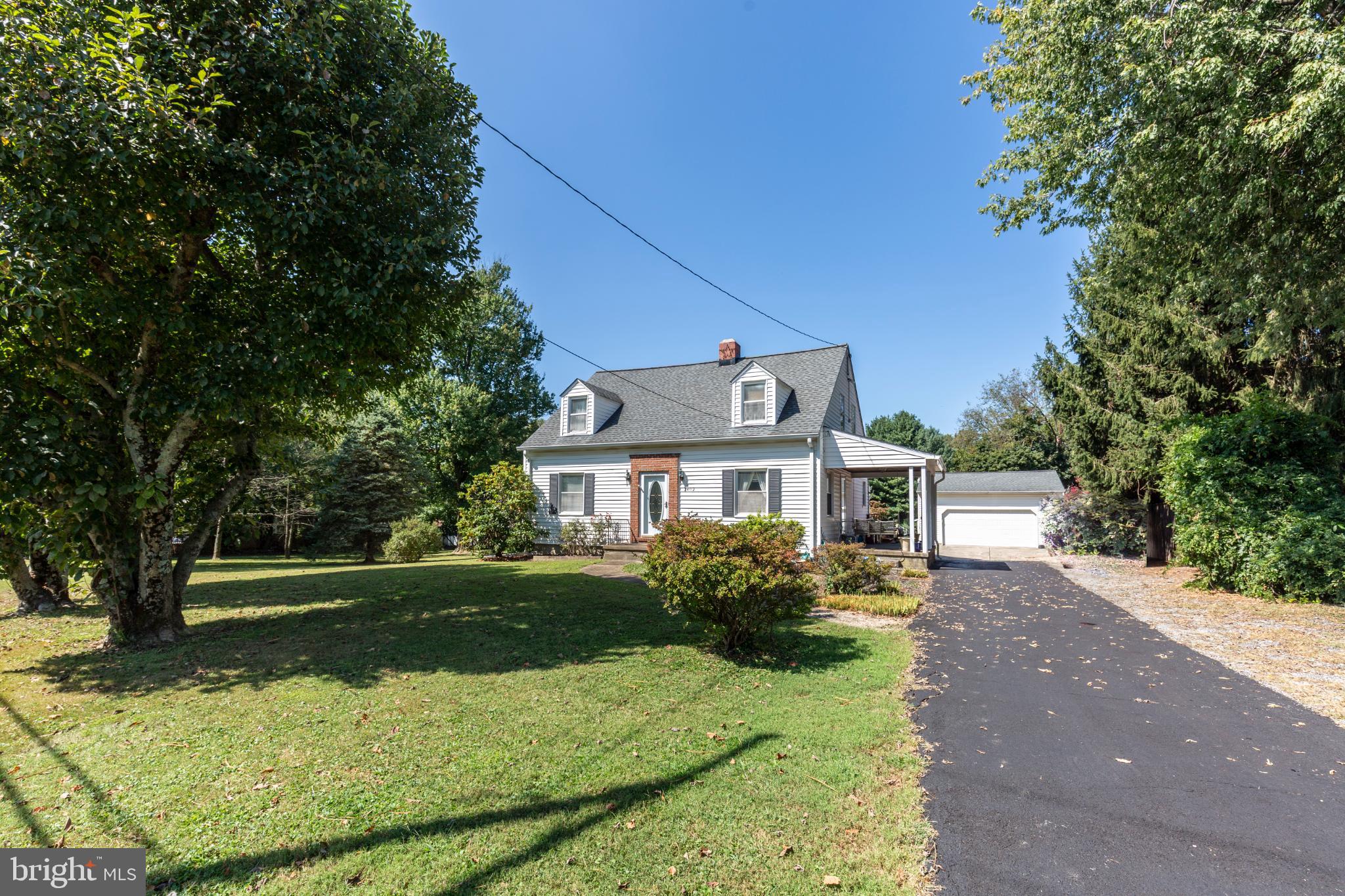 3402 Offutt Road Randallstown, MD 21133 - Photo 6 of 63 a view of a house with a yard
