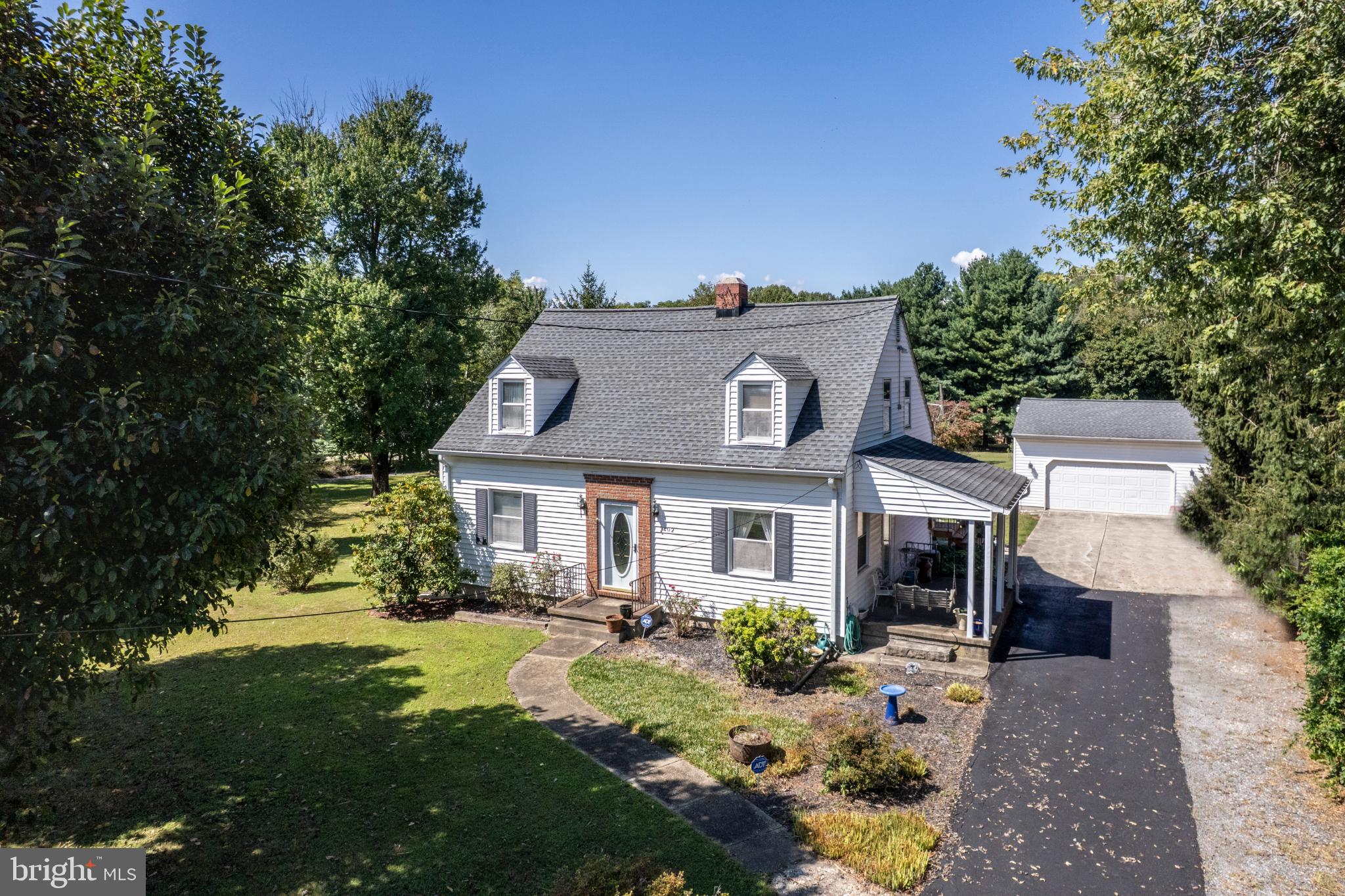 3402 Offutt Road Randallstown, MD 21133 - Photo 7 of 63 Charming home nestled in lush greenery.