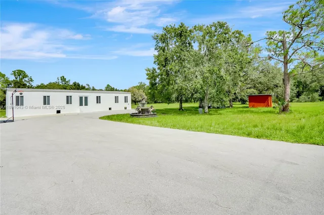 a view of a garden with a slide