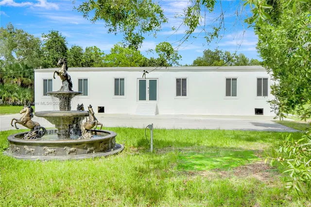 a house view with a garden space