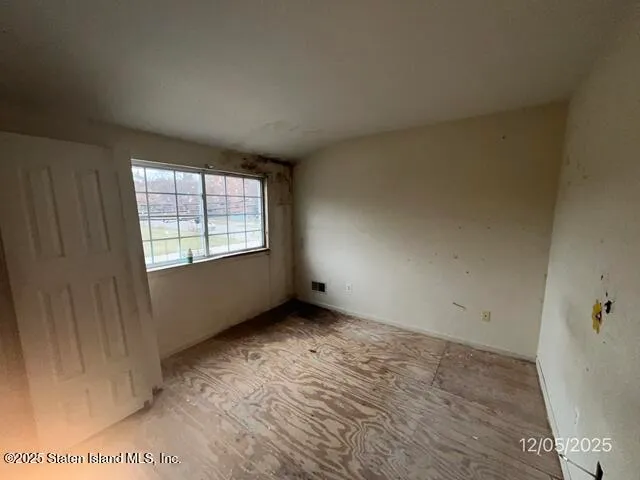 an empty room with windows