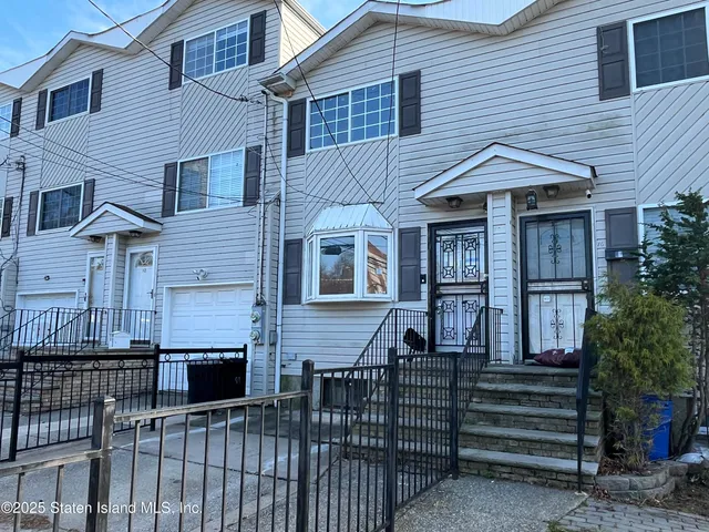 a front view of a house with a balcony