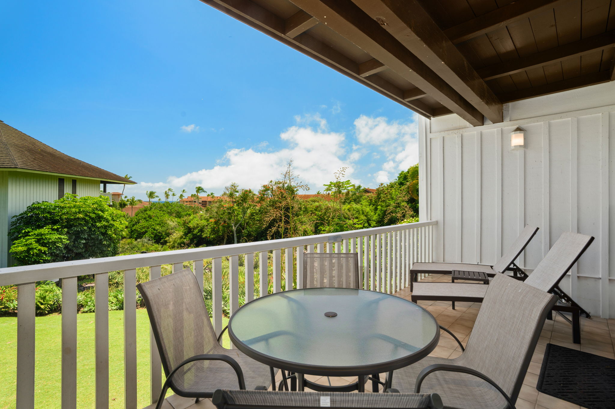 2253 Poipu Road, Unit 330 Koloa, HI 96756 - Photo 1 of 26 a view of a chairs and table in the balcony
