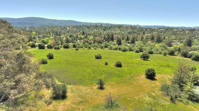 26140 Robb Road Palo Alto, CA 94306 - Photo 6 of 28 a view of a lake with a mountain