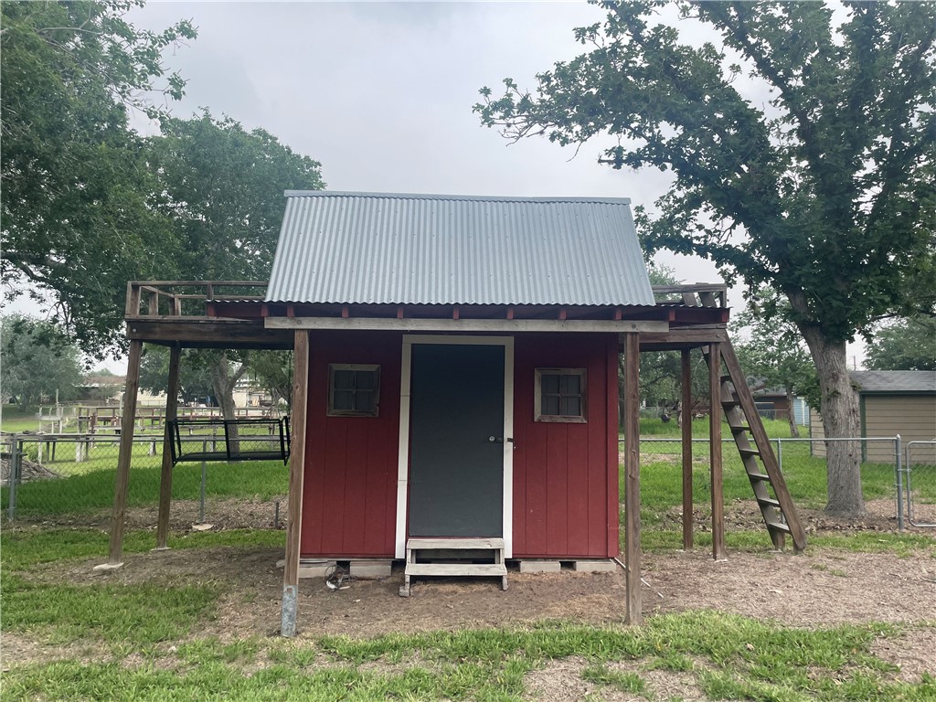 24857 Lakeview (cr 360) Mathis, TX 78368 - Photo 20 of 31 front view of a house with a yard