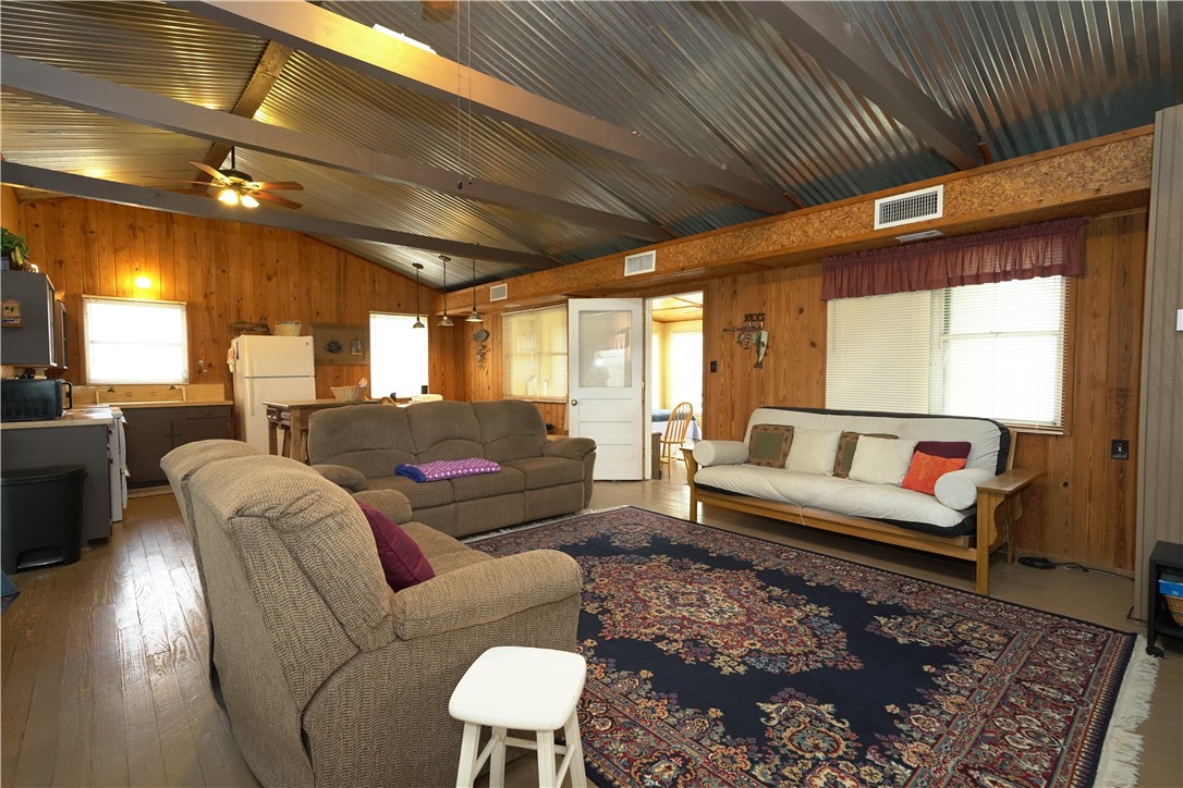 24857 Lakeview (cr 360) Mathis, TX 78368 - Photo 2 of 31 a living room with furniture and a rug