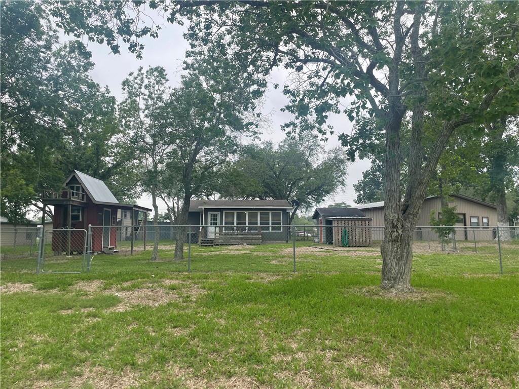 24857 Lakeview (cr 360) Mathis, TX 78368 - Photo 27 of 31 a view of a house with a big yard and plants