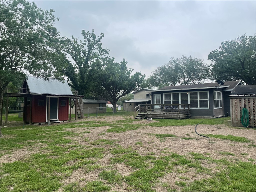 24857 Lakeview (cr 360) Mathis, TX 78368 - Photo 29 of 31 a front view of a house with a garden
