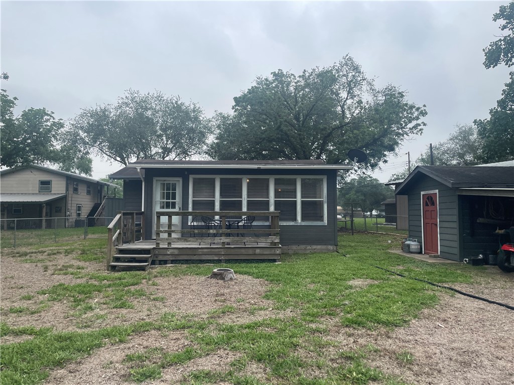 24857 Lakeview (cr 360) Mathis, TX 78368 - Photo 30 of 31 a front view of a house with a yard