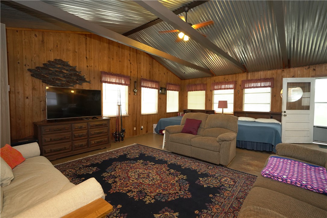 24857 Lakeview (cr 360) Mathis, TX 78368 - Photo 5 of 31 a living room with furniture and a flat screen tv