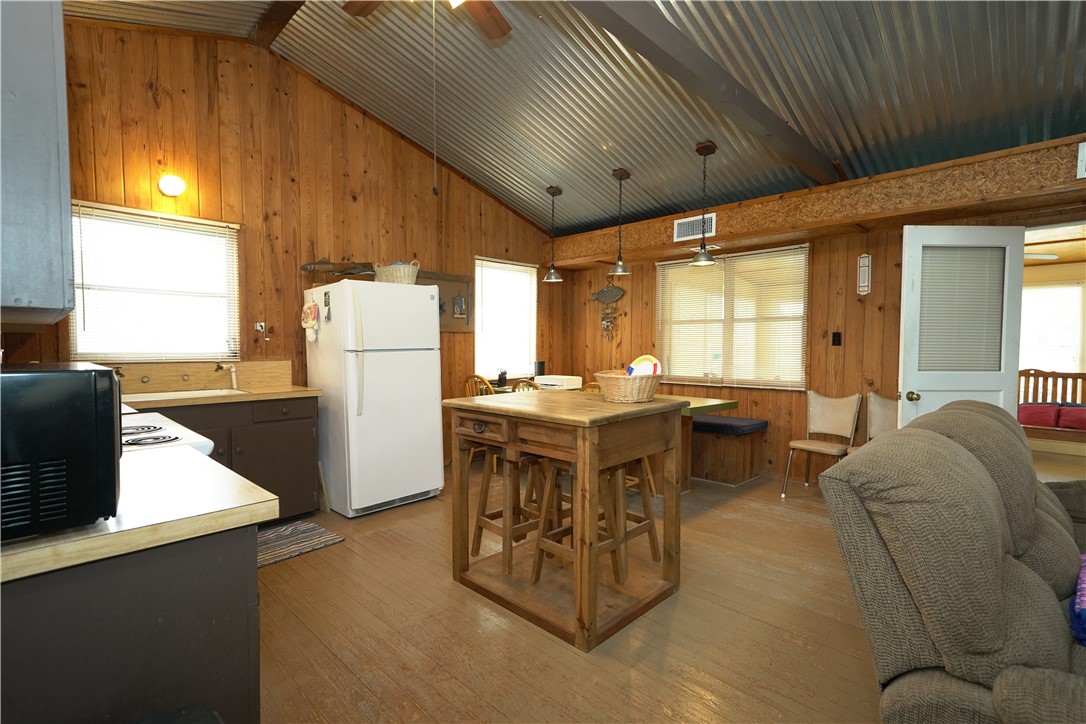 24857 Lakeview (cr 360) Mathis, TX 78368 - Photo 7 of 31 a living room with a couch and a table