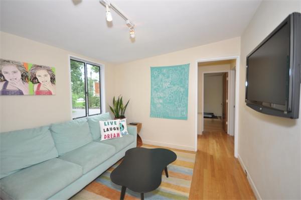 21 Moon Hill Road Lexington, MA 02421 - Photo 12 of 17 a living room with furniture and a flat screen tv