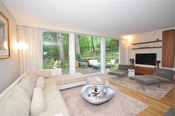 21 Moon Hill Road Lexington, MA 02421 - Photo 3 of 17 a living room with furniture and a fireplace