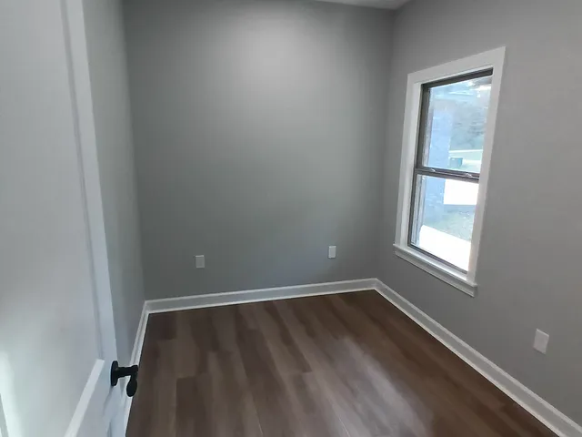 an empty room with windows