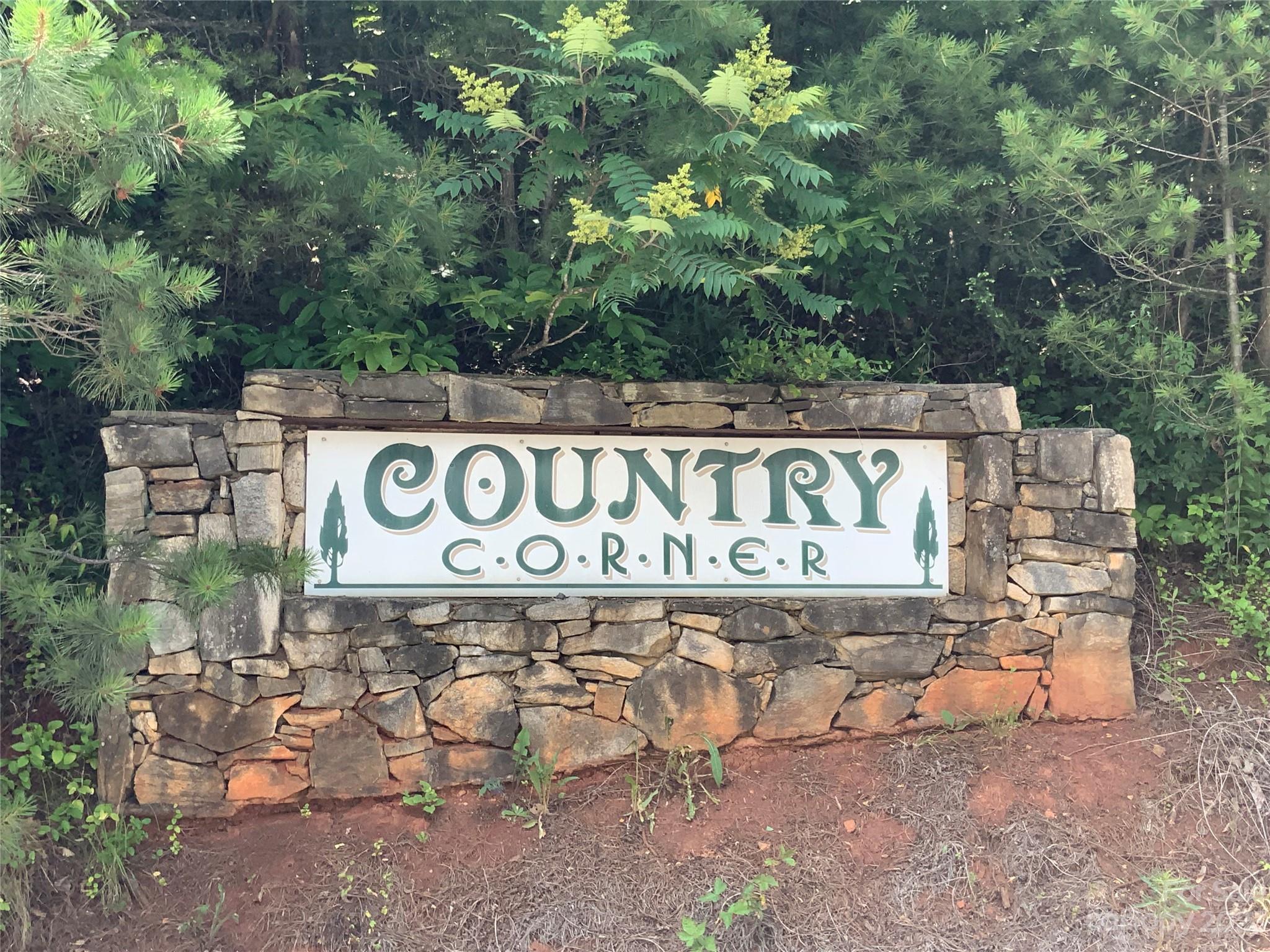 95 Winding Ridge Road, Unit 19 Marshall, NC 28753 - Photo 1 of 10 a sign that is on a brick wall