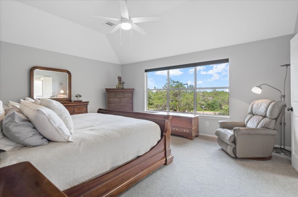 10801 Beachmont Lane Austin, TX 78739 - Photo 15 of 40 Gorgeous view of the treetops from your spacious primary bedroom upstairs