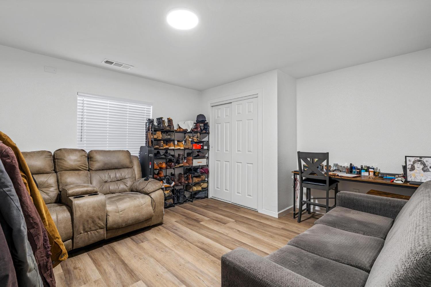 1432 Page Court Modesto, CA 95354 - Photo 18 of 62 a living room with furniture and a couch
