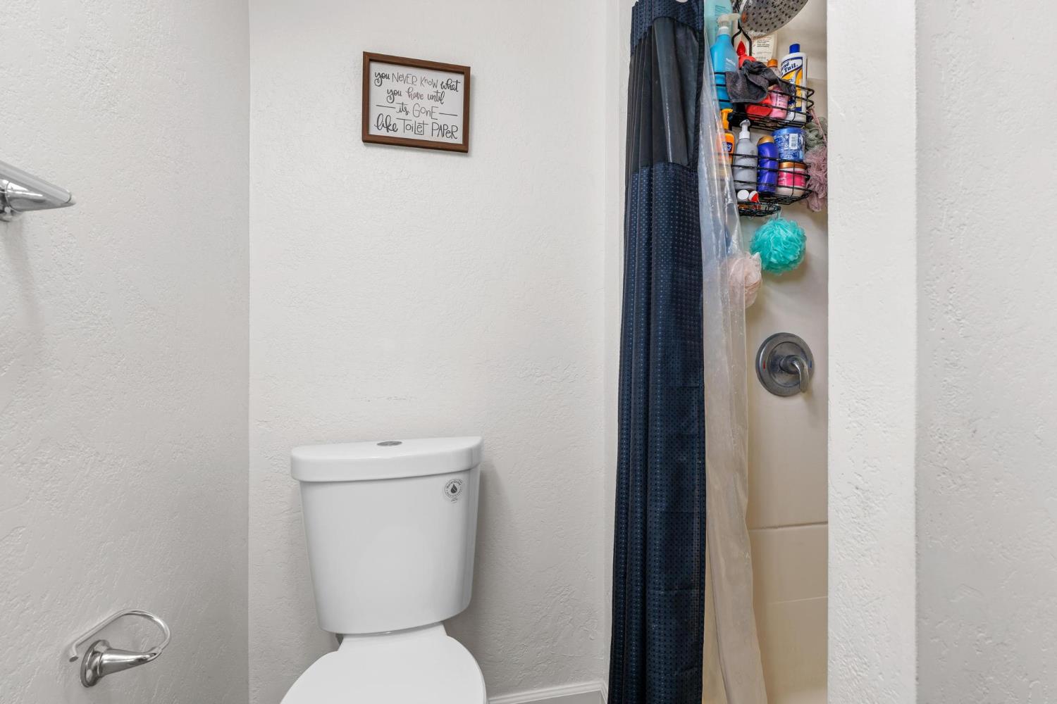 1432 Page Court Modesto, CA 95354 - Photo 41 of 62 a bathroom with a toilet and a sink