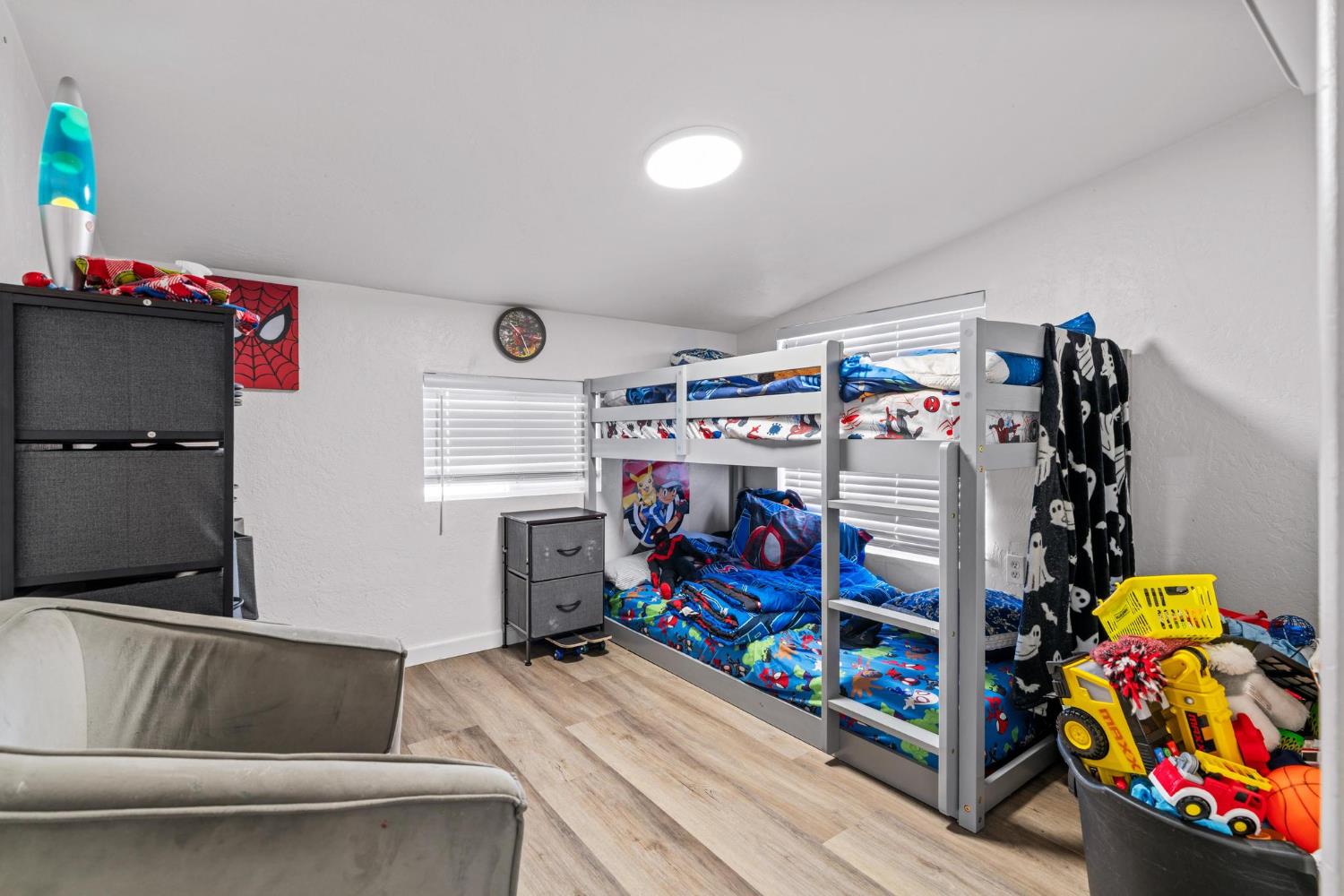 1432 Page Court Modesto, CA 95354 - Photo 43 of 62 a utility room with fridge and a couch