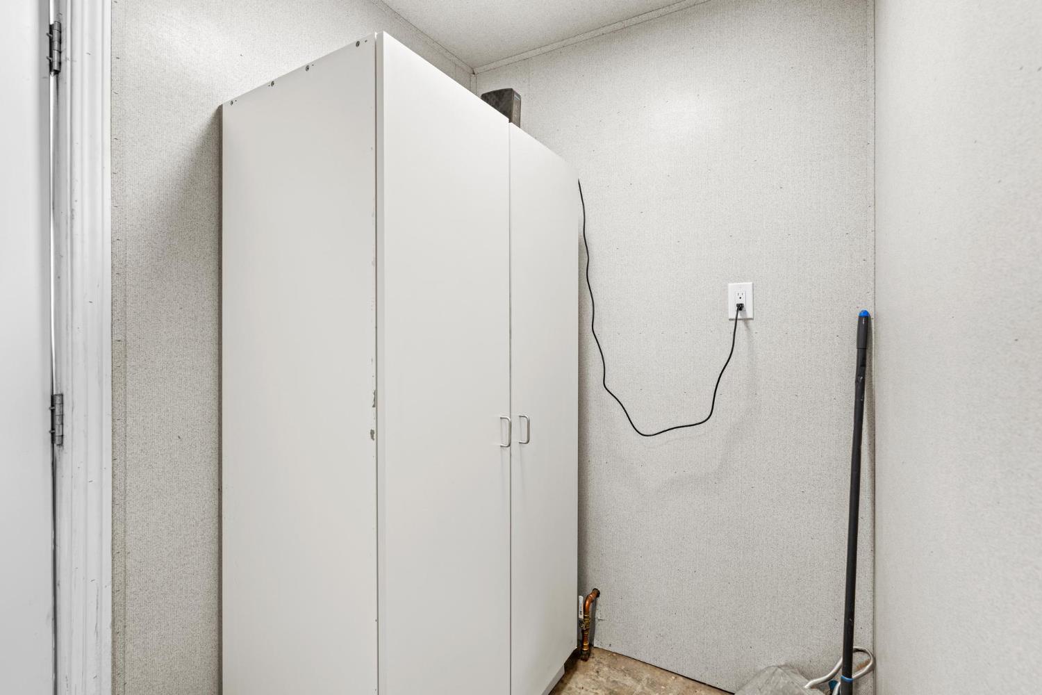 1432 Page Court Modesto, CA 95354 - Photo 50 of 62 a bathroom with a glass shower door