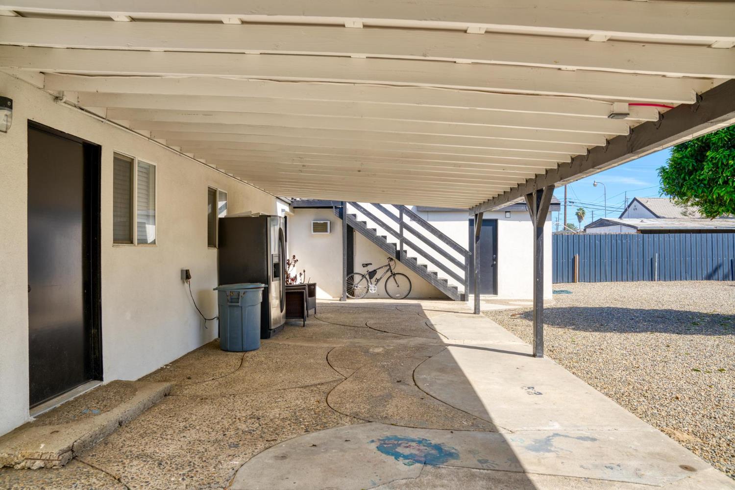 1432 Page Court Modesto, CA 95354 - Photo 51 of 62 a view of a hall with wooden floor