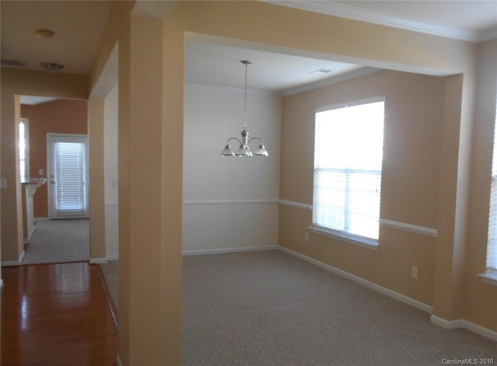 294 Garnet Court, Unit 520 Fort Mill, SC 29708 - Photo 6 of 13 a view of an empty room with a window