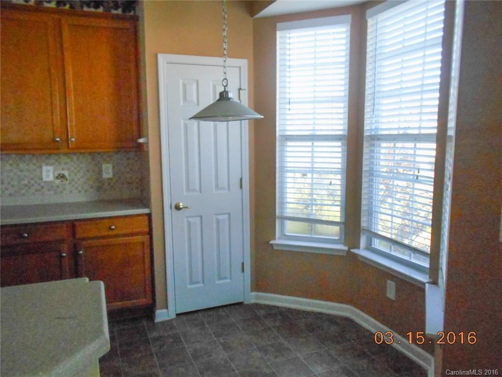 294 Garnet Court, Unit 520 Fort Mill, SC 29708 - Photo 7 of 13 a view of an empty room with a window