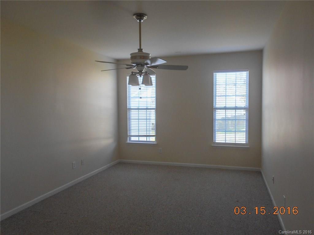 294 Garnet Court, Unit 520 Fort Mill, SC 29708 - Photo 10 of 13 a view of an empty room with a window