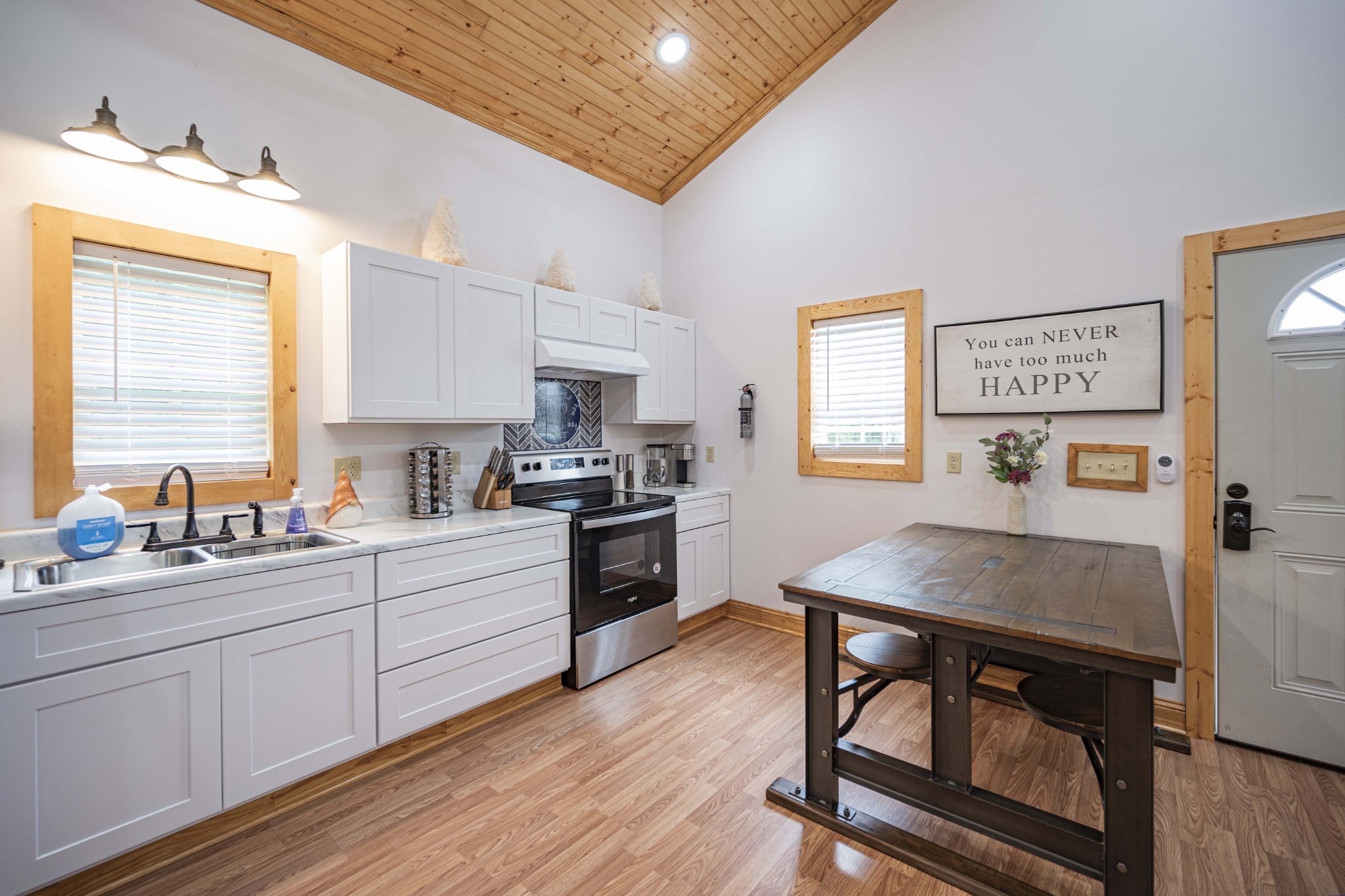 2281 Jefferson Road Smithville, TN 37166 - Photo 12 of 25 a kitchen with a stove a sink and a refrigerator