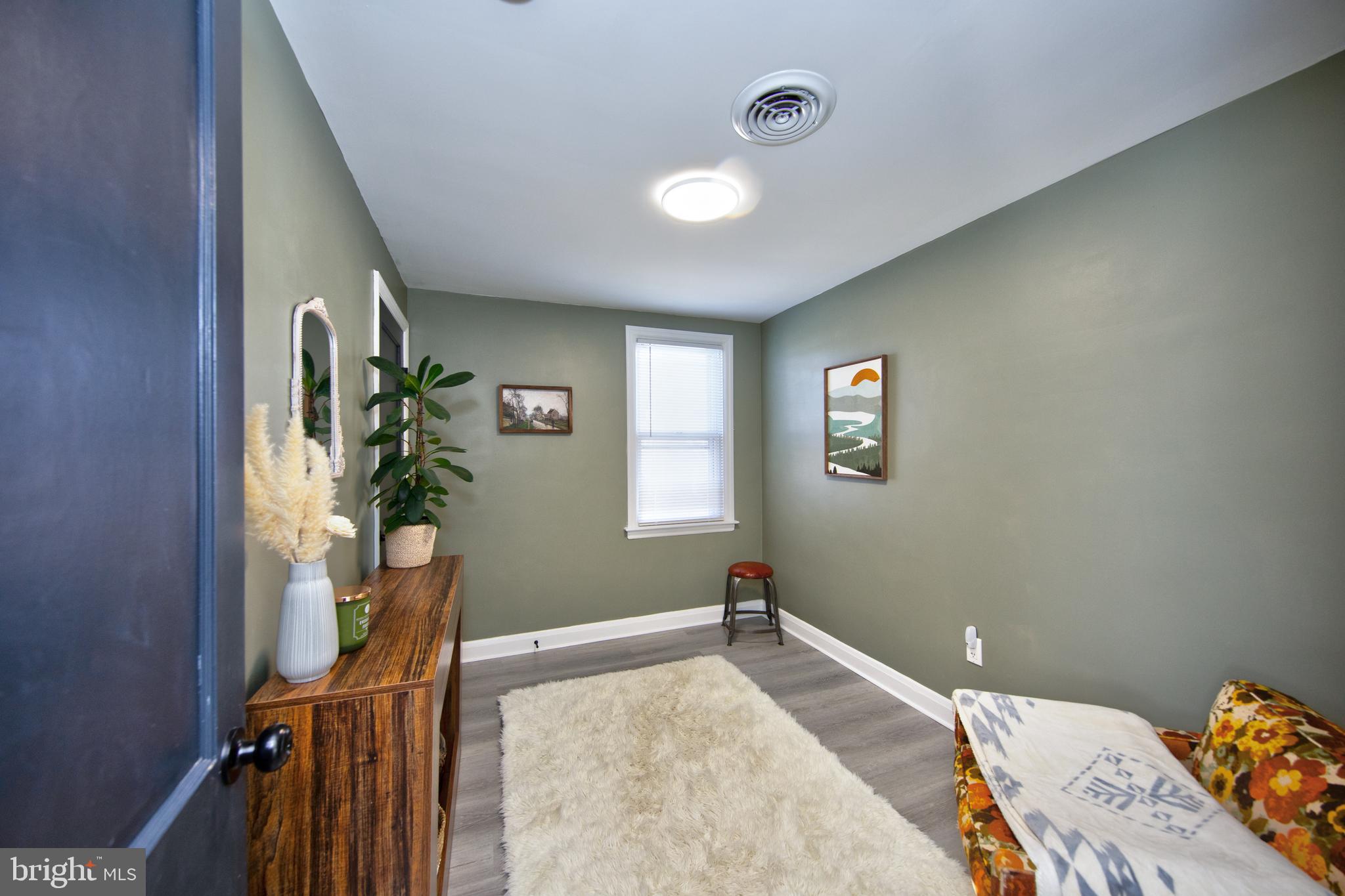 109 Elinor Avenue Nottingham, MD 21236 - Photo 18 of 33 a bedroom with a bed and a window